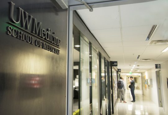 Second-year students outside the Medical Student Lobby in the Health Sciences Building at the UW School of Medicine.