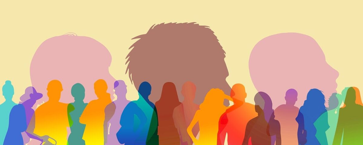 Multi-colored silhouette of a diverse group of people