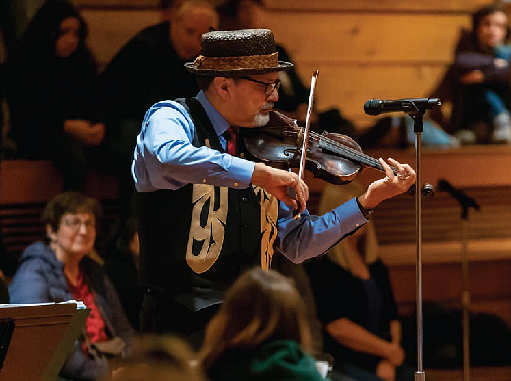 Picture of person playing the violin