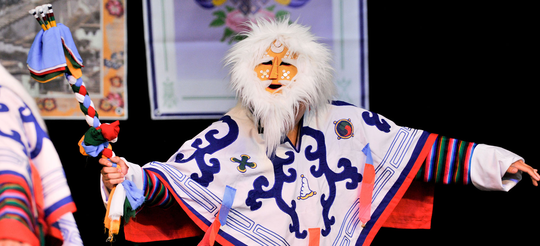 Photo of a person wearing a tibetan costume