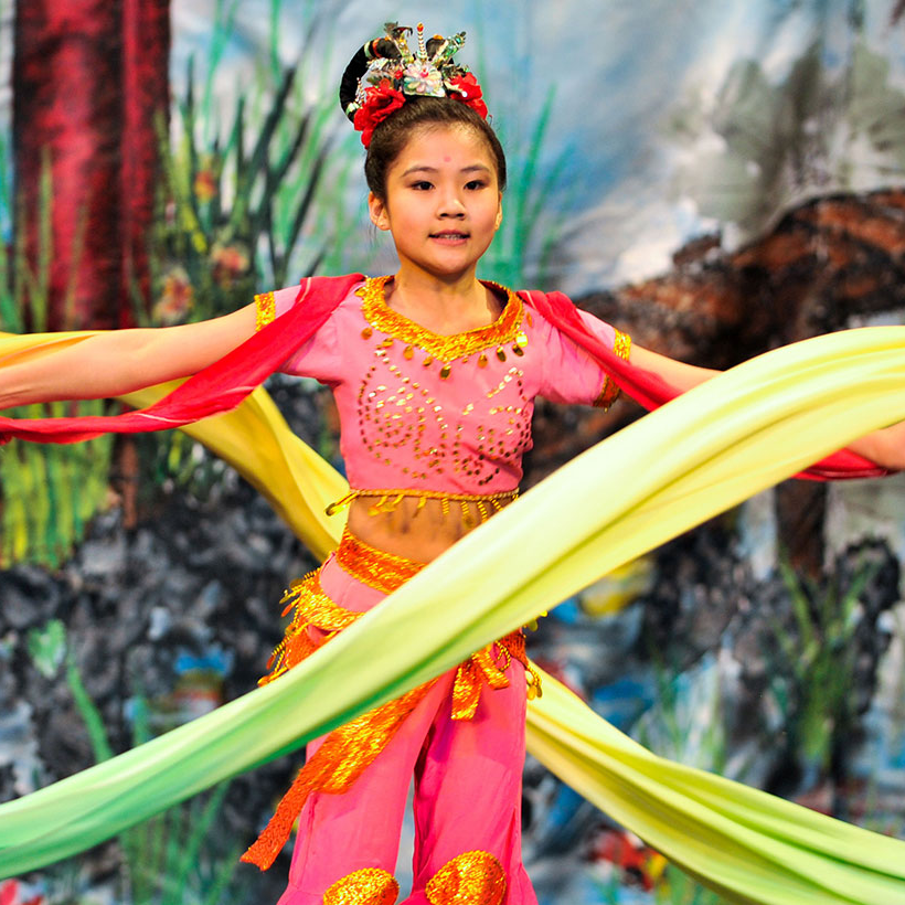 Photo of a Chinese dancer wearing traditional clothing.